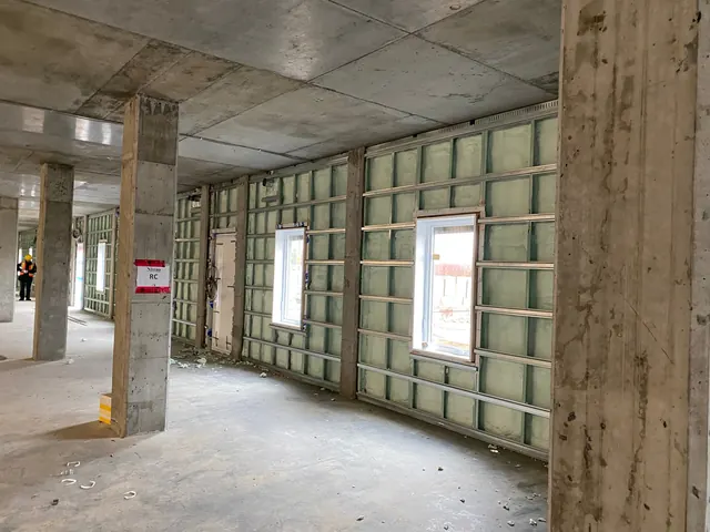 Ground floor with foamed exterior walls between concrete columns